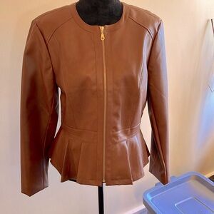 Faux leather moto jacket with pleats. Brand new with tags! Don’t wait on this!